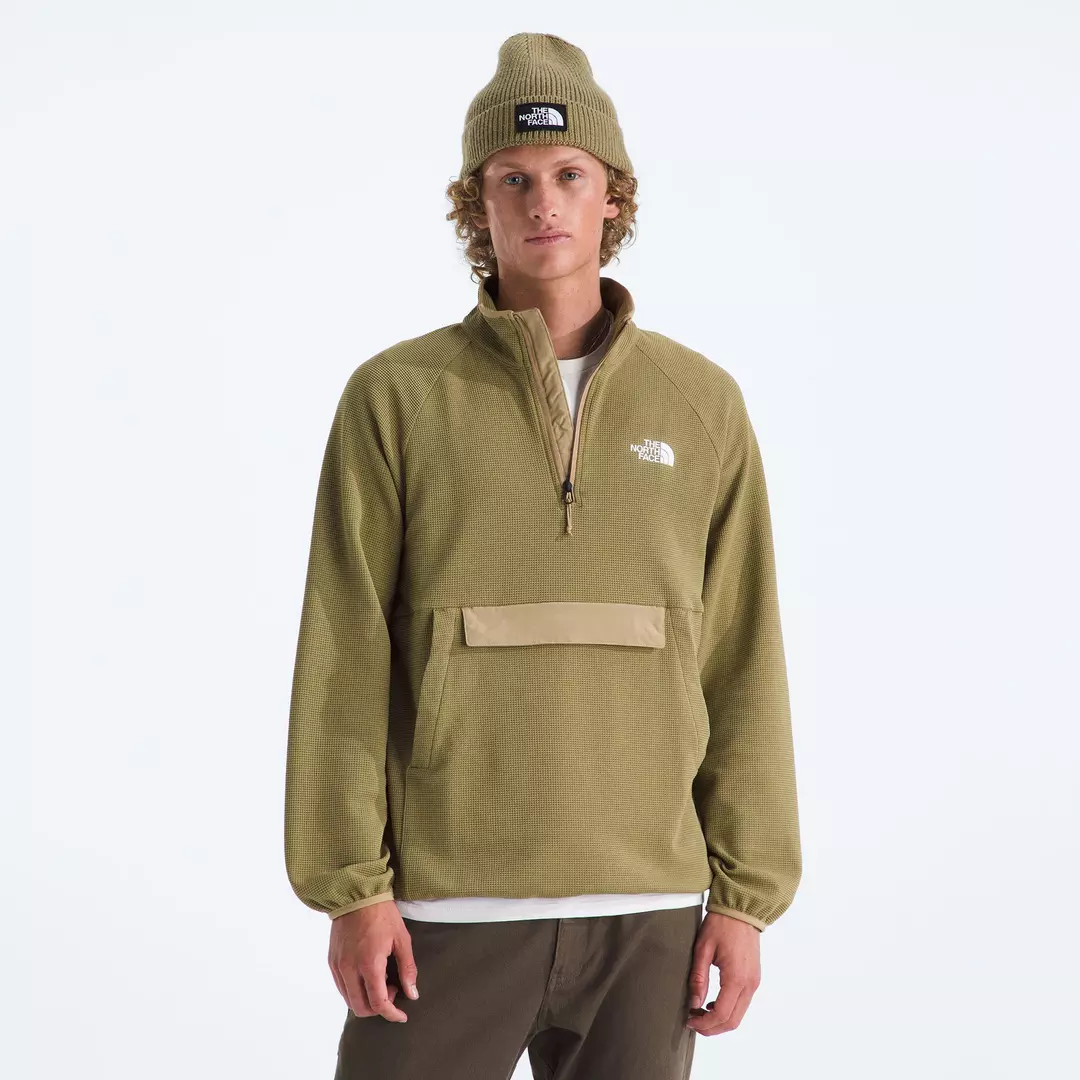 greenish-khaki coloured pullover jacket from The North Face with a front pouch pocket