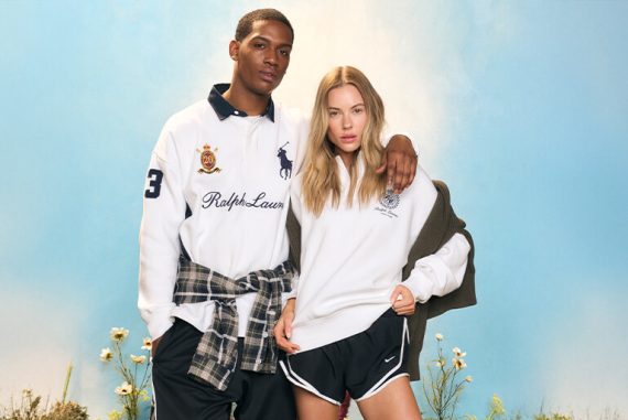 Man and woman in white Ralph Lauren and Nike sportswear against a blue sky.